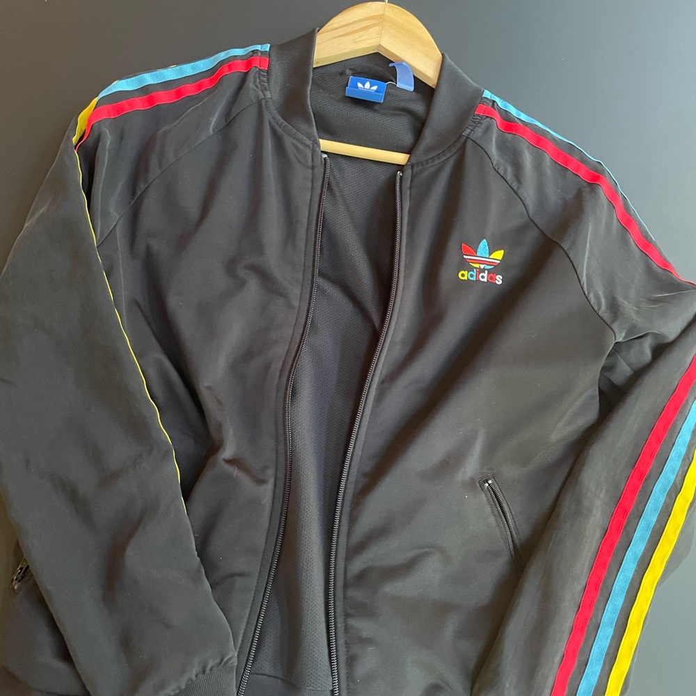 Adidas jacket with zipper.  Women's medium.